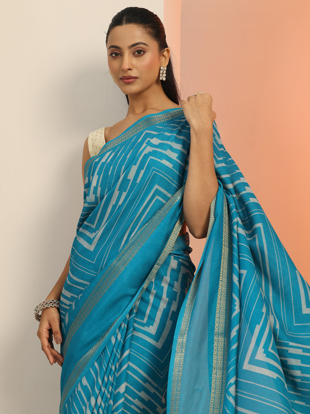  Teal Printed Georgette Saree With Unstitched Blouse Piece 