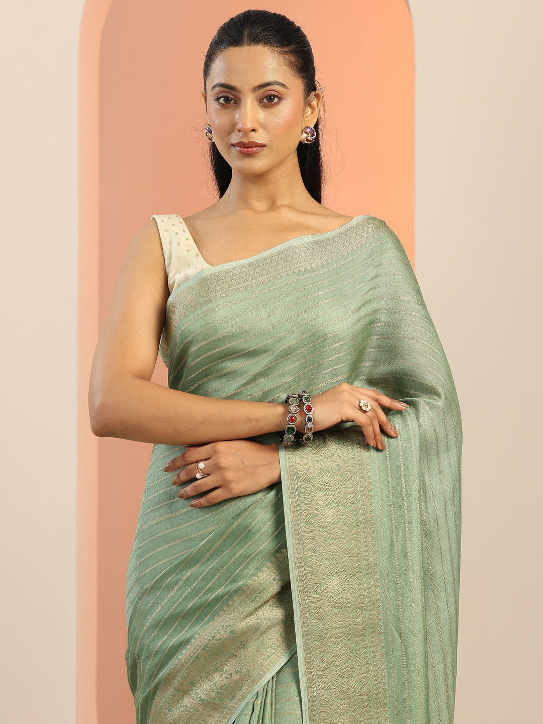  Green Woven Design Georgette Saree With Unstitched Blouse Piece 