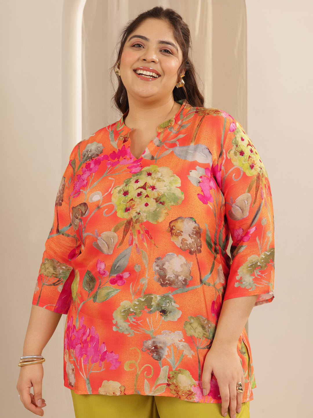  Plus Size Orange Printed Muslin Straight Short Kurti 