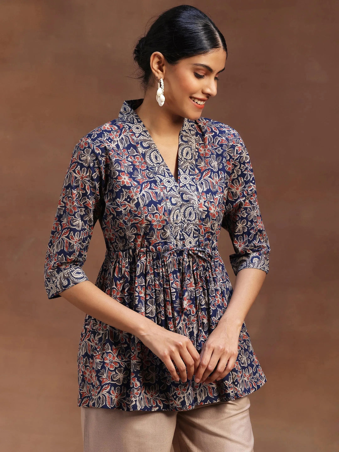  Blue Printed Cotton A-Line Kurti 