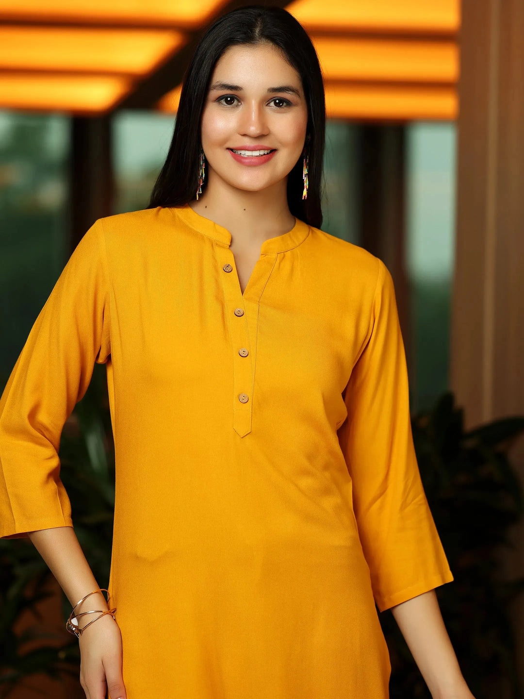  Mustard Solid Rayon Straight Kurti 