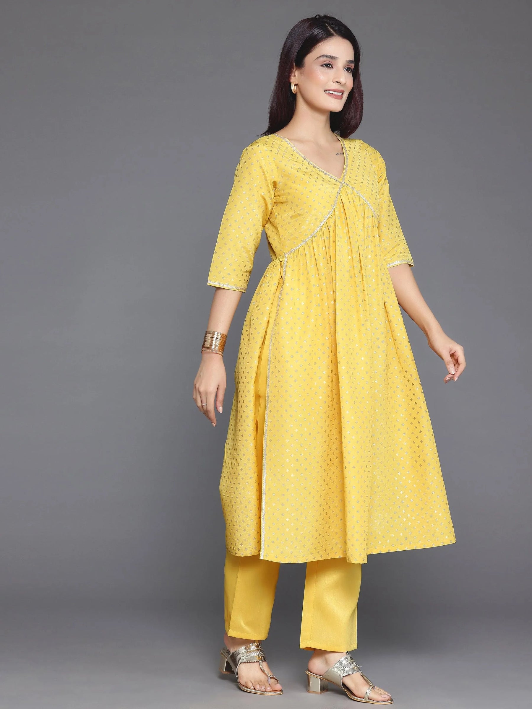 Plus Size Yellow Assymetric kurta With Inner And Trousers