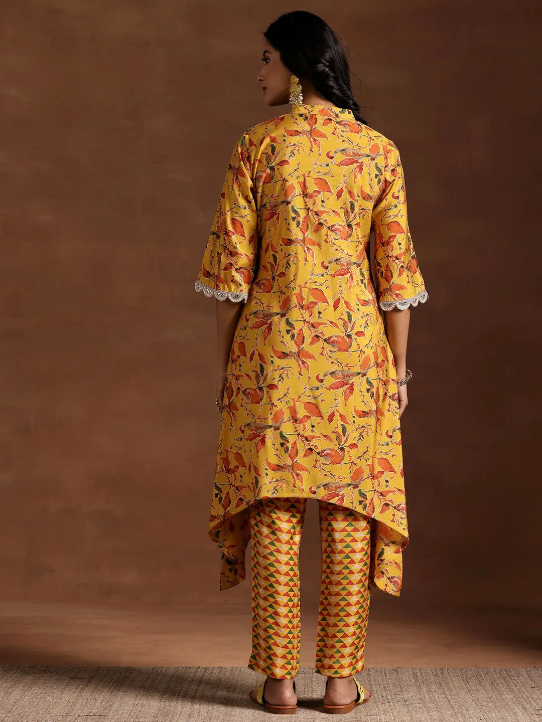  Mustard Printed Silk Blend A-line Kurta With Trousers 