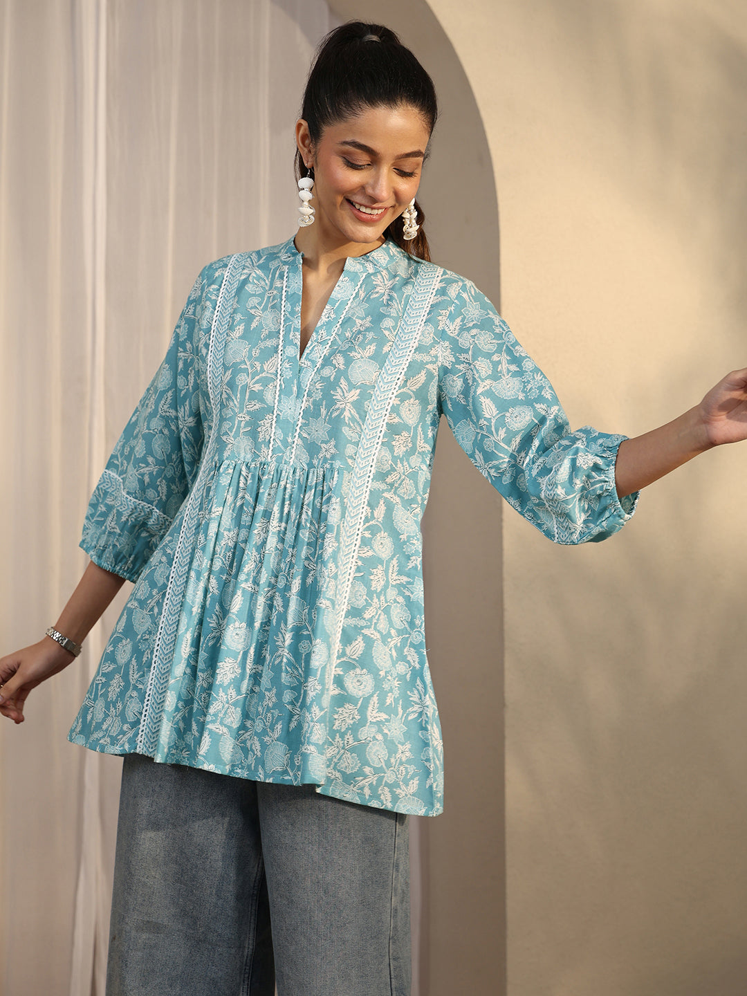  Blue Printed Cotton A-Line Short Kurti 