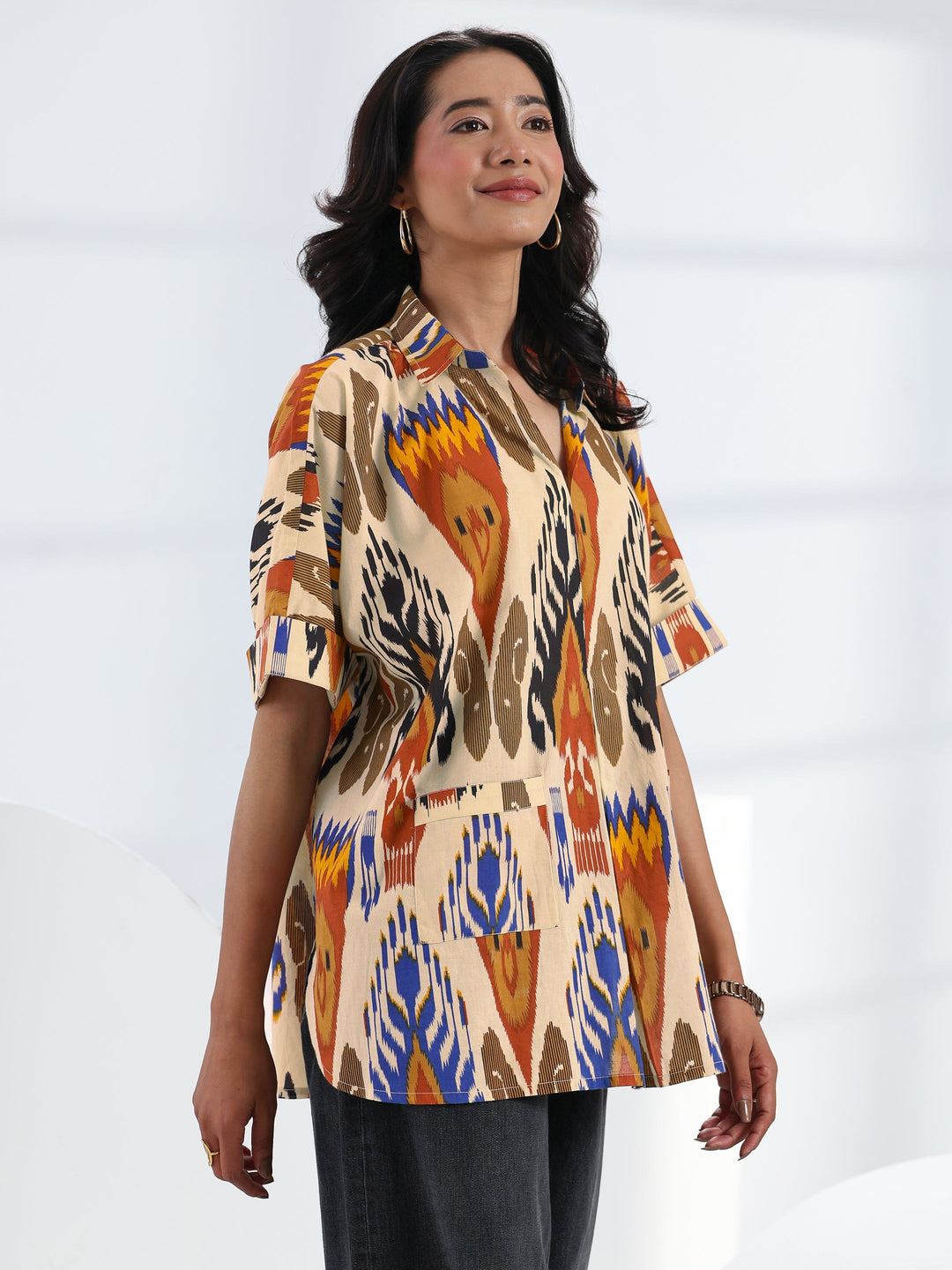  Multi- Coloured Abstract Printed Cotton Straight Short Kurti 