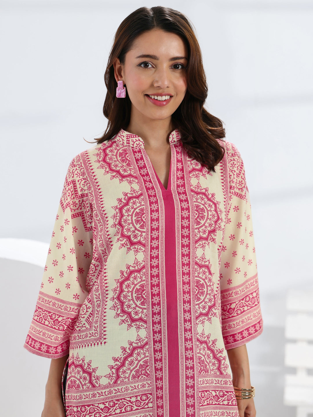  Pink Ethnic Motif Printed Cotton Blend Straight Short Kurti 