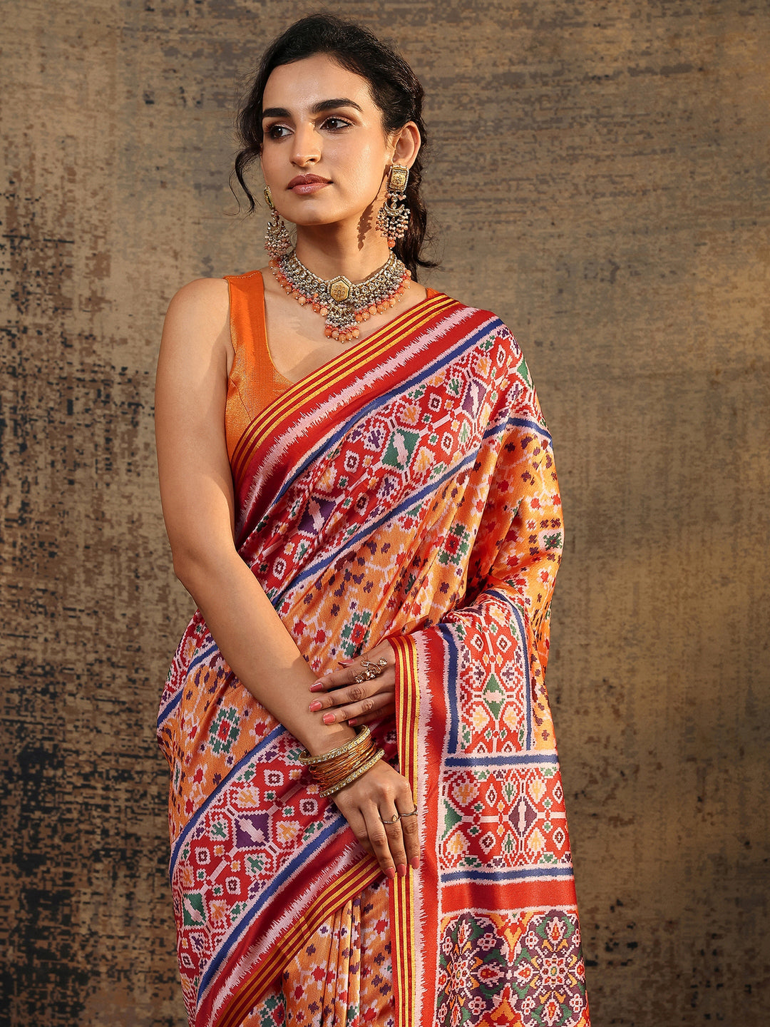  Orange Ikat Printed Silk Saree With Unstitched Blouse Piece 
