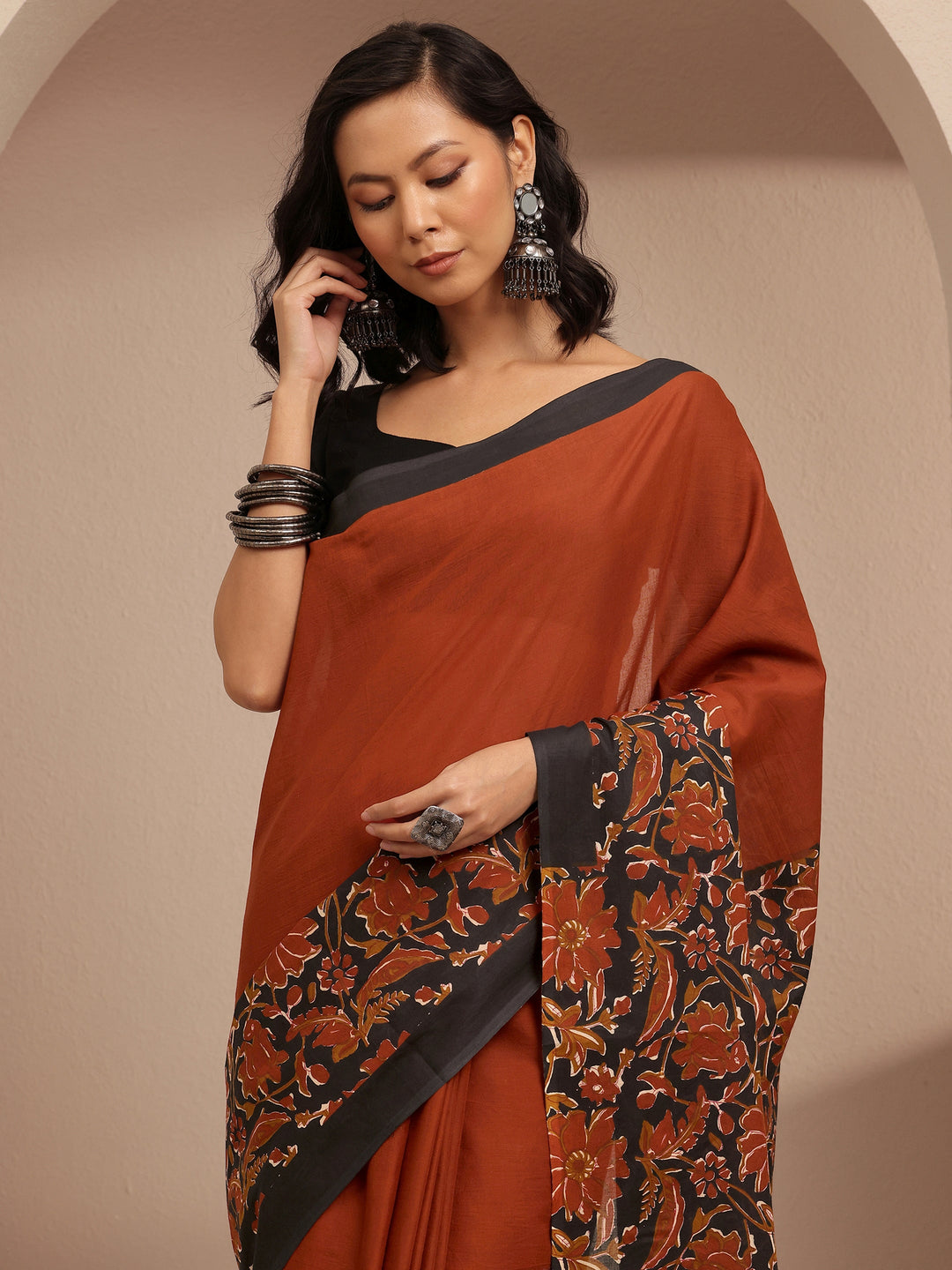  Rust Solid Cotton Saree With Unstitched Blouse Piece 