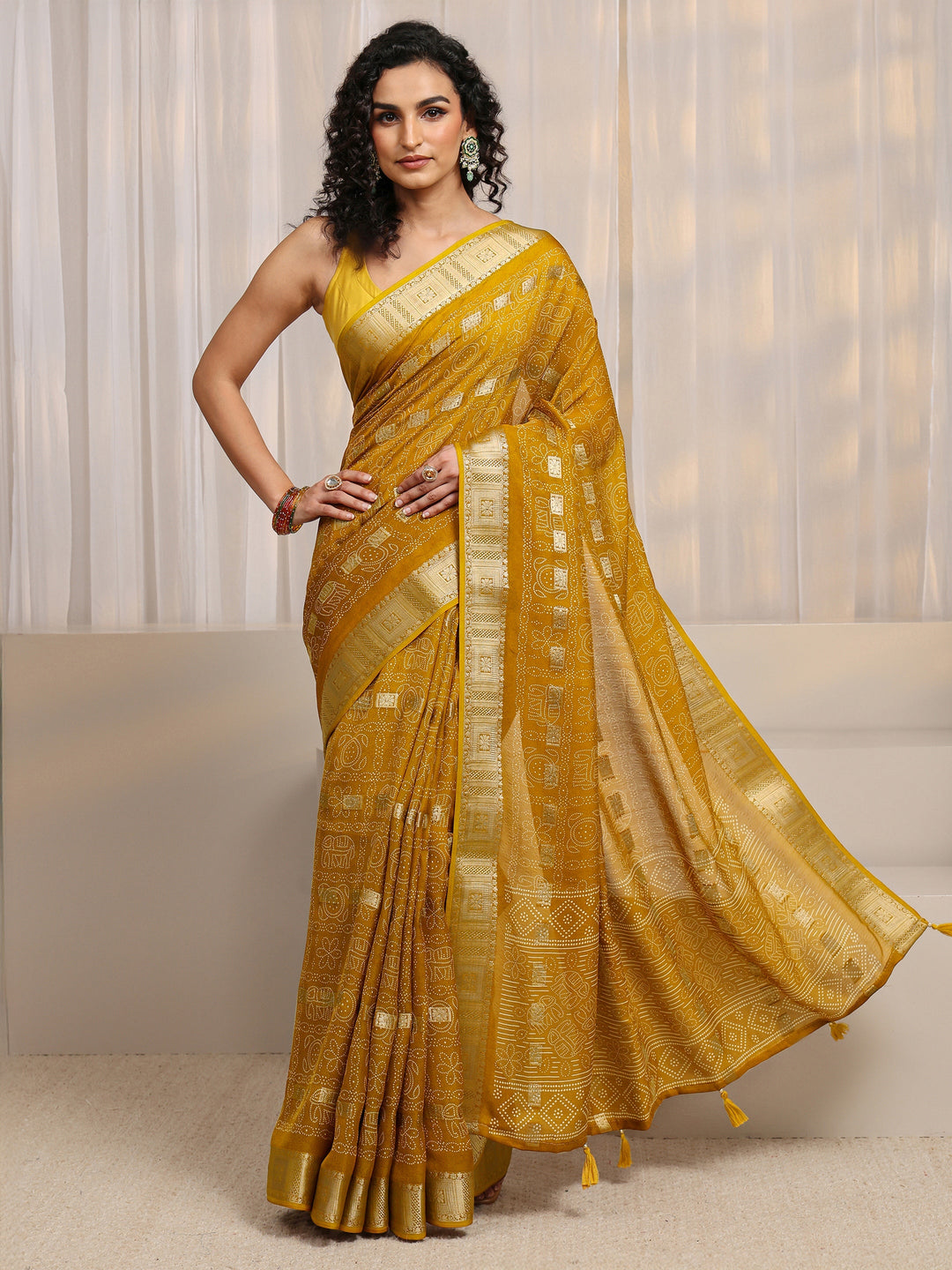  Mustard Bandhani Printed Silk Blend Saree 
With Unstitched Blouse Piece 