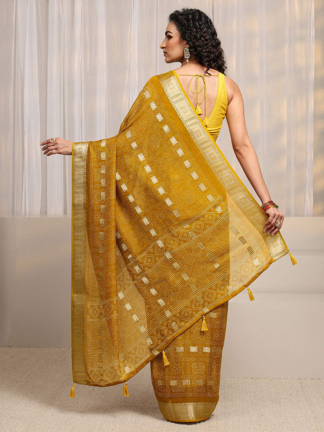  Mustard Bandhani Printed Silk Blend Saree 
With Unstitched Blouse Piece 