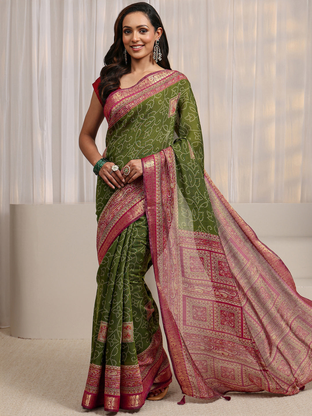  Green Bandhani Printed Silk Blend Saree 
With Unstitched Blouse Piece 