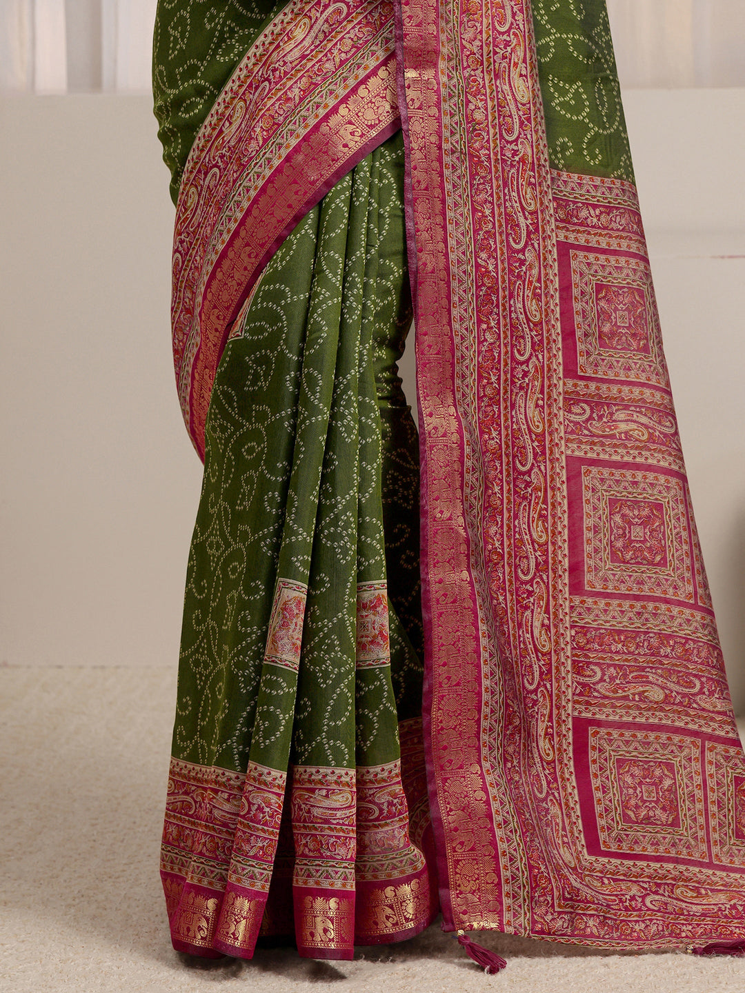  Green Bandhani Printed Silk Blend Saree 
With Unstitched Blouse Piece 
