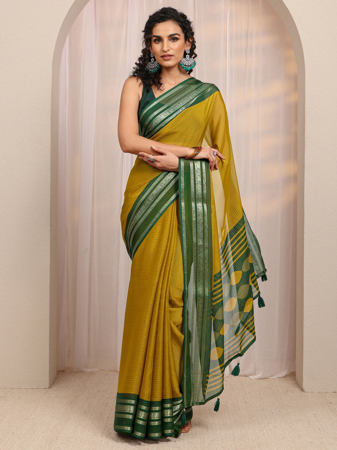 Mustard Printed Silk Blend Saree 
With Unstitched Blouse Piece 