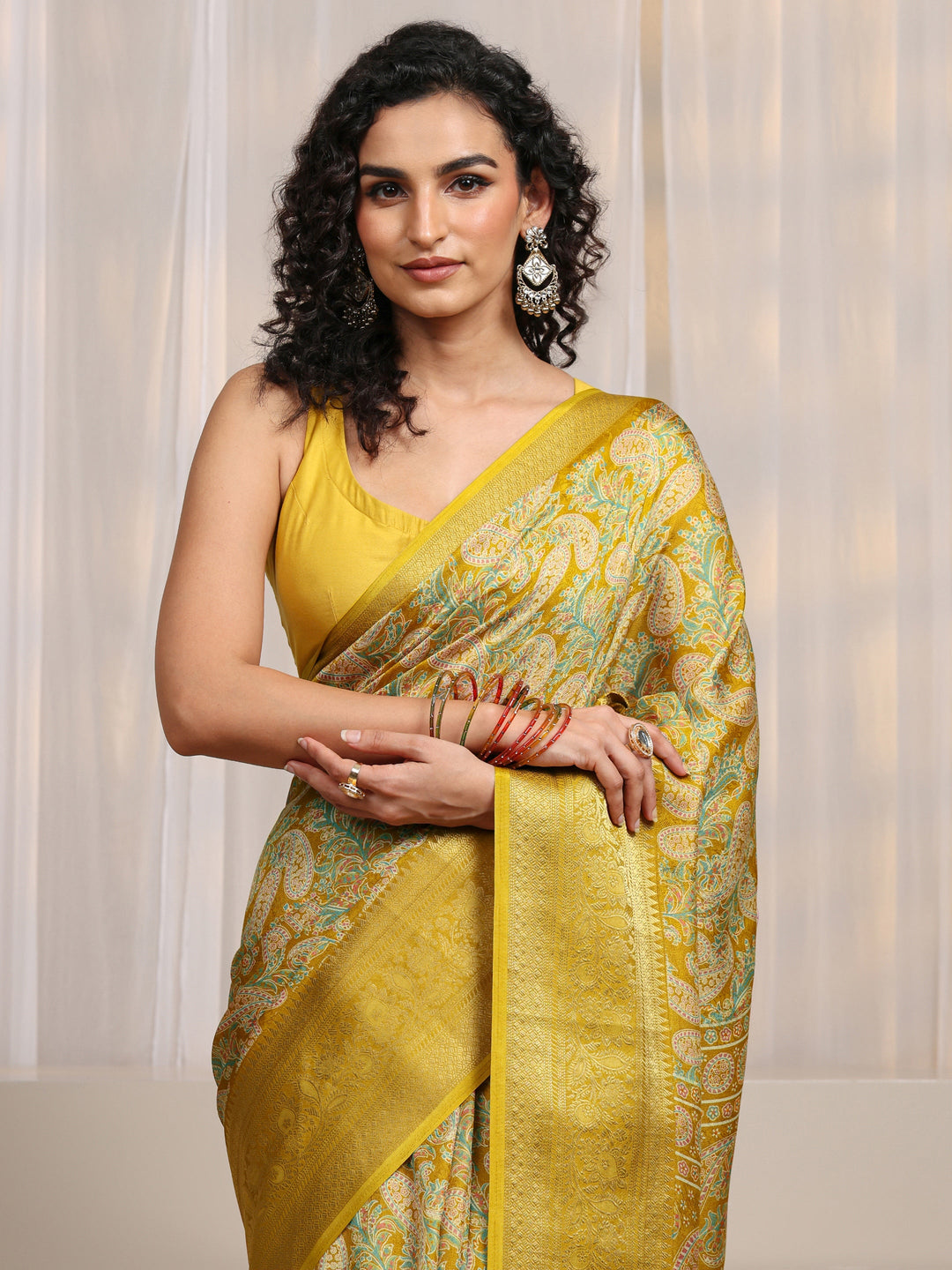  Mustard Paisley Printed Silk Blend Saree 
With Unstitched Blouse Piece 