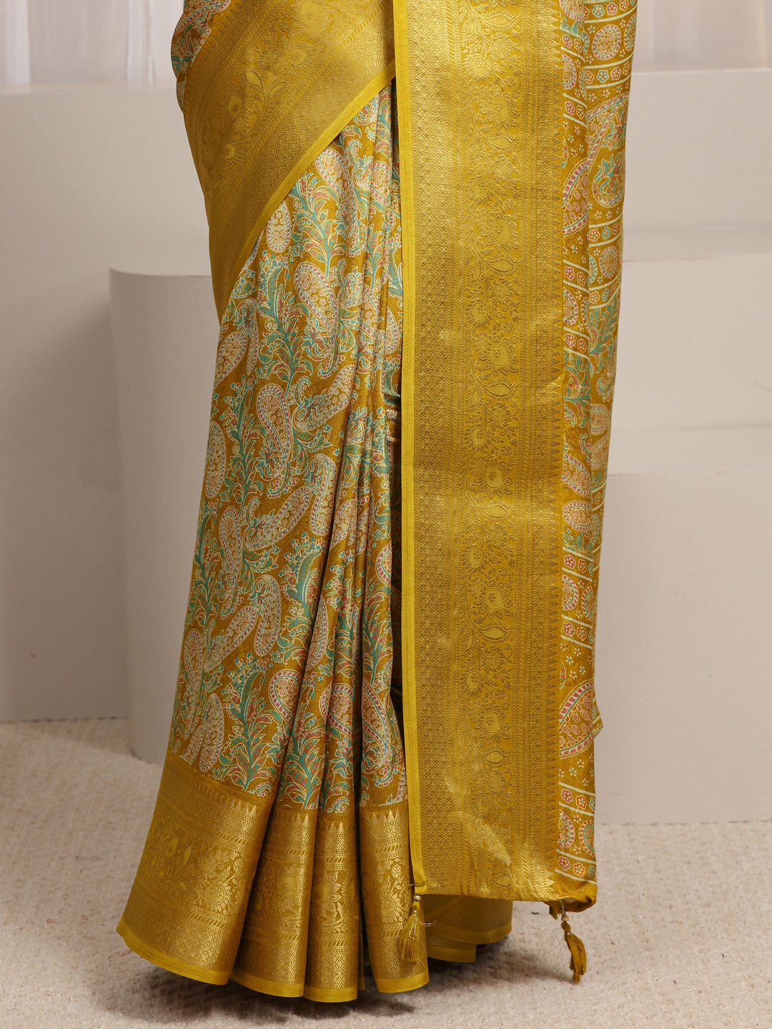  Mustard Paisley Printed Silk Blend Saree 
With Unstitched Blouse Piece 