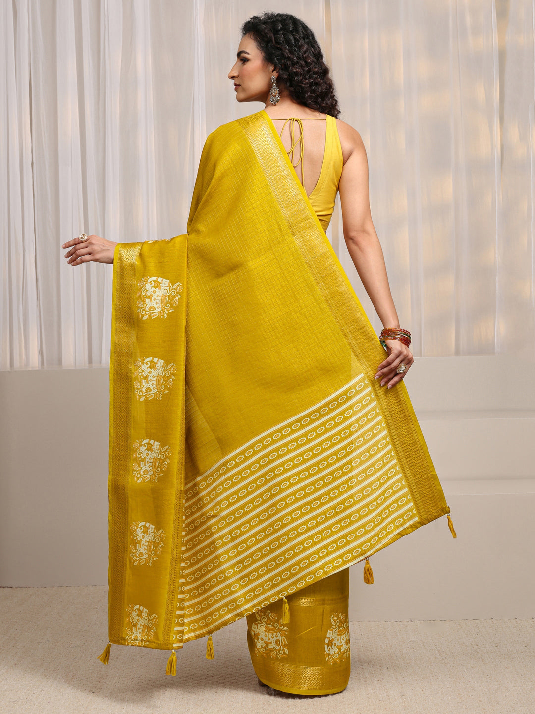  Mustard Ethnic Motif Woven Design Silk Blend Saree 
With Unstitched Blouse Piece 