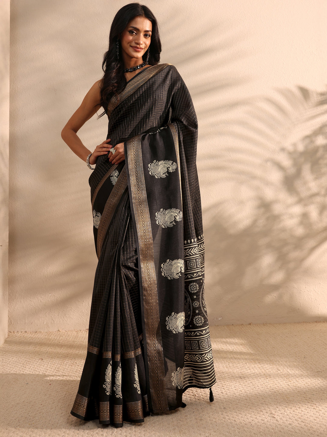  Black Printed Silk Blend Saree 
With Unstitched Blouse Piece 