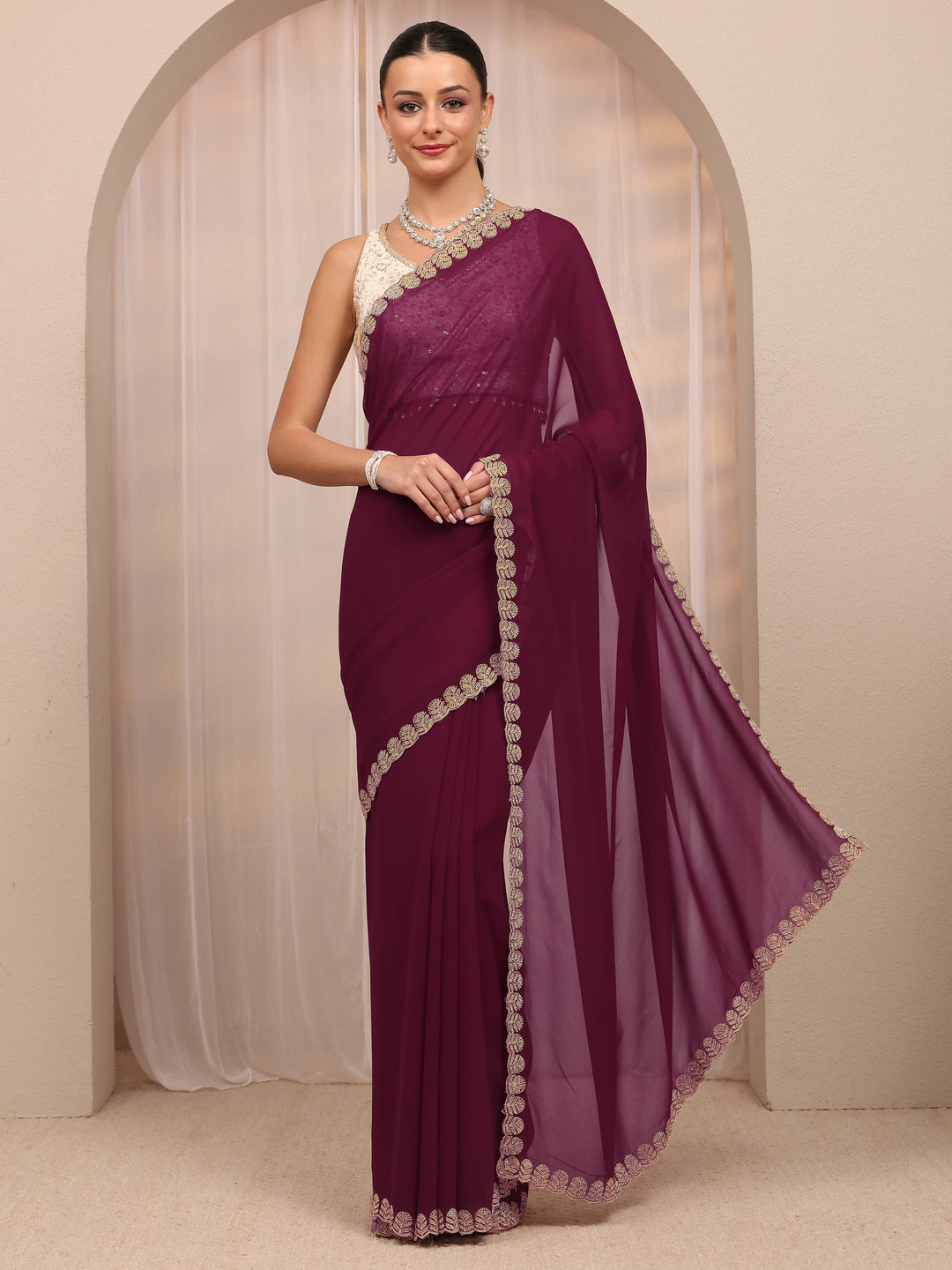  Maroon Embellished Silk Blend Saree 
With Unstitched Blouse Piece 