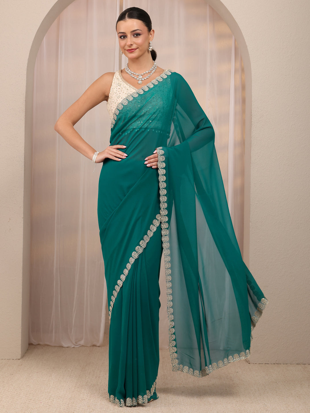  Teal Green Embellished Silk Blend Saree 
With Unstitched Blouse Piece 
