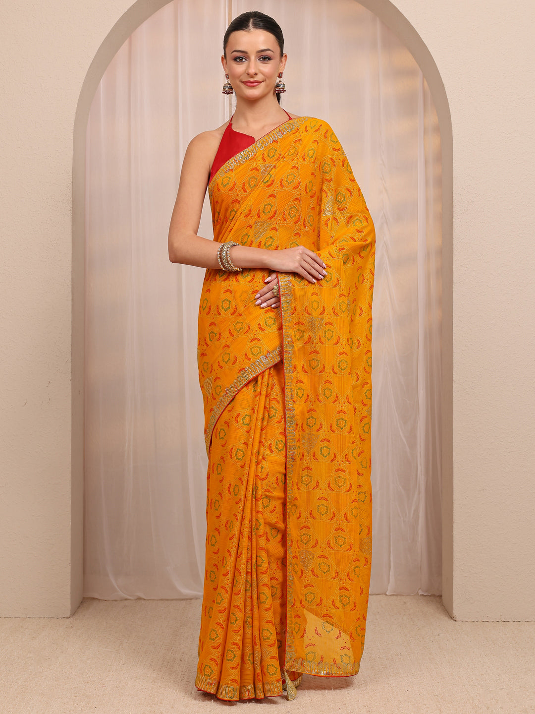  Mustard Bandhani Printed Silk Blend Saree 
With Unstitched Blouse Piece 