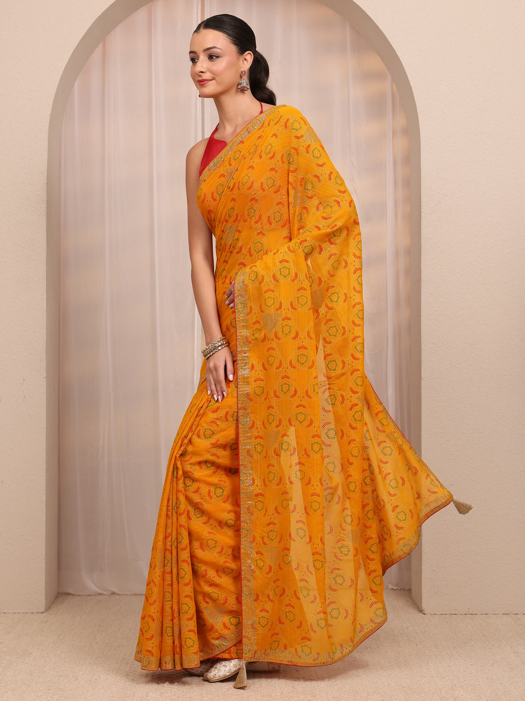  Mustard Bandhani Printed Silk Blend Saree 
With Unstitched Blouse Piece 