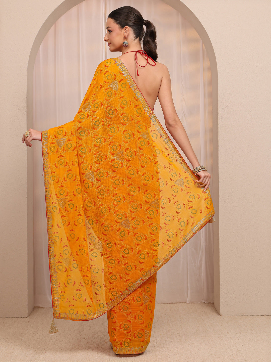  Mustard Bandhani Printed Silk Blend Saree 
With Unstitched Blouse Piece 