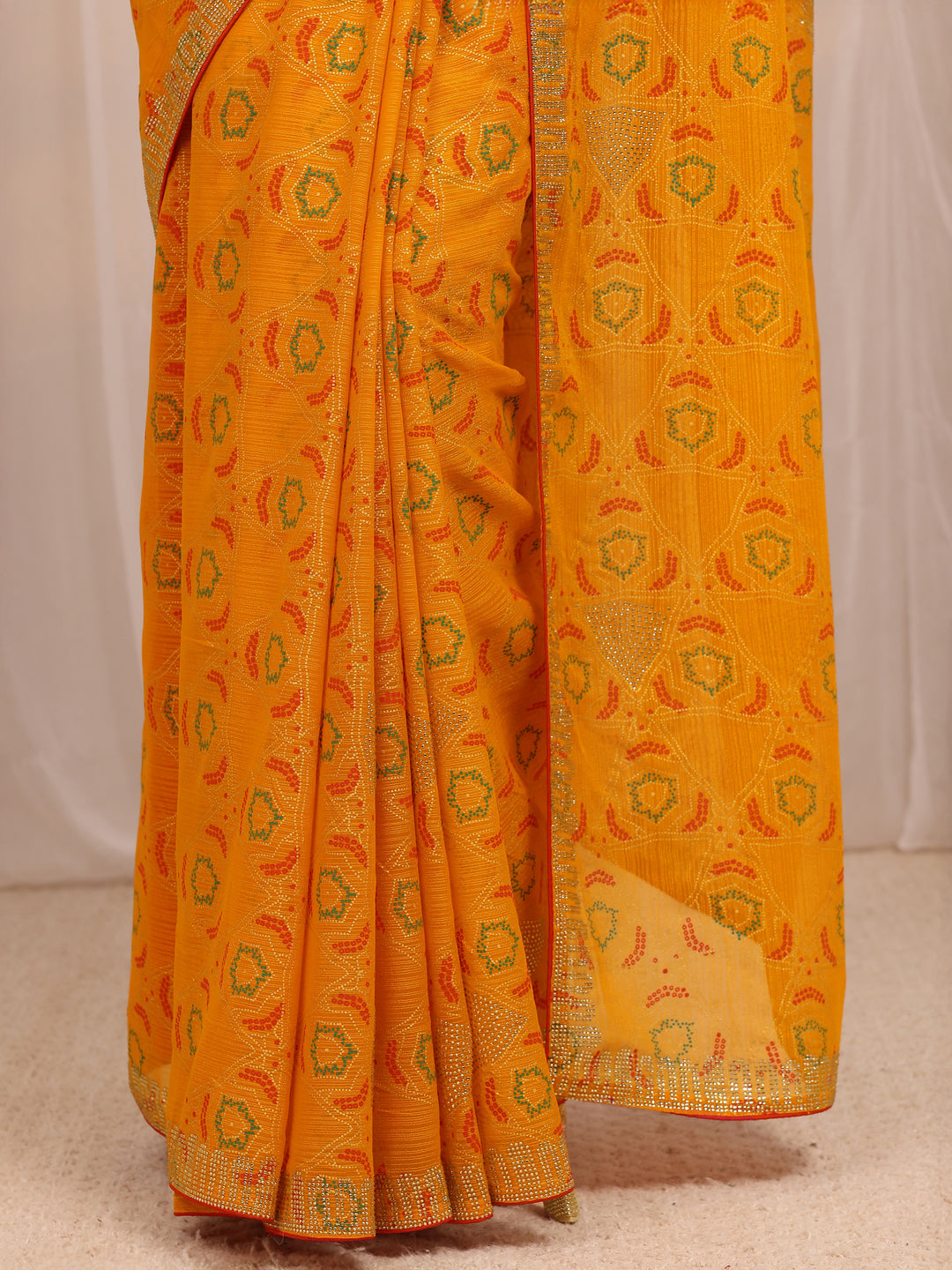  Mustard Bandhani Printed Silk Blend Saree 
With Unstitched Blouse Piece 