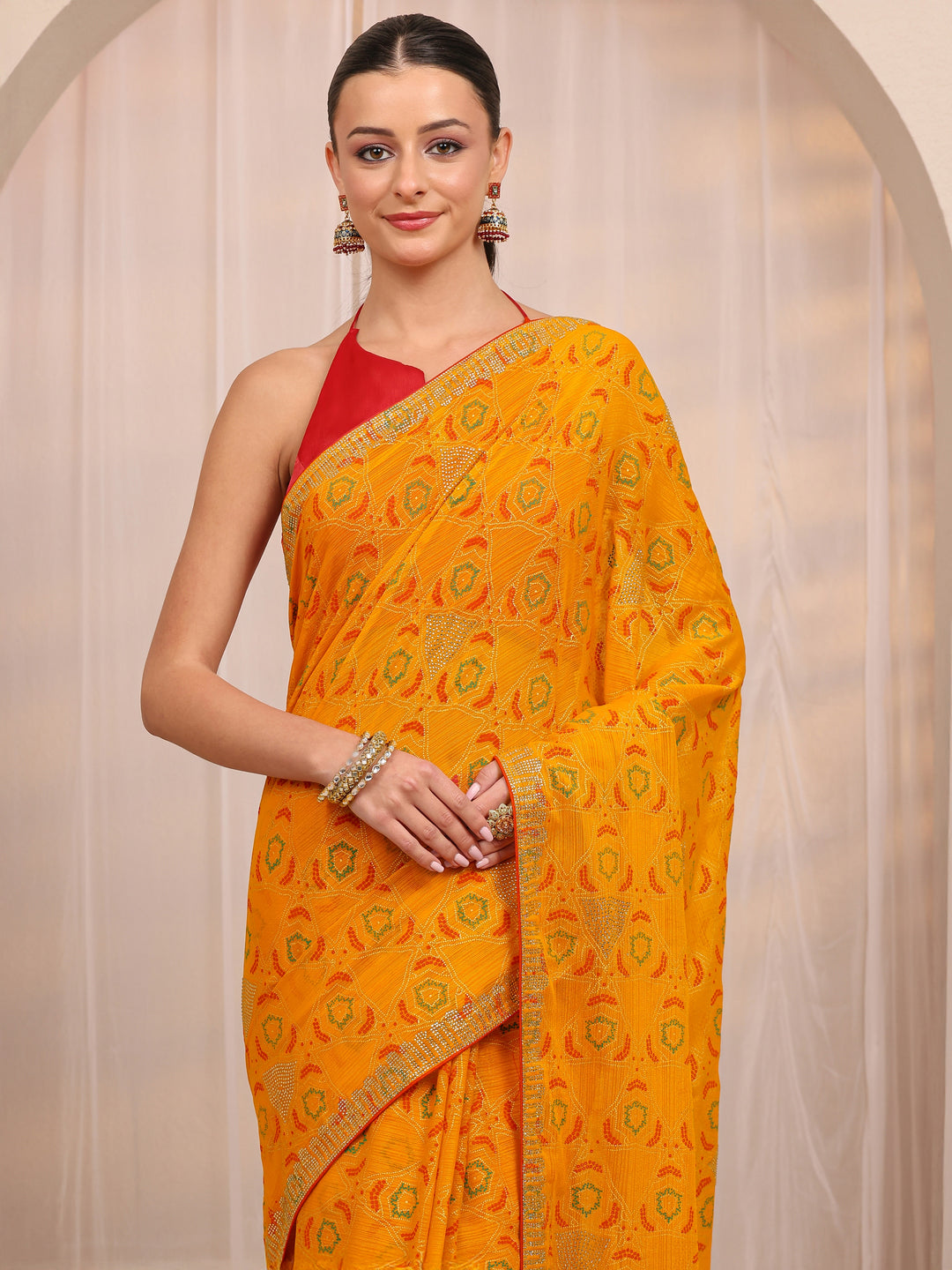  Mustard Bandhani Printed Silk Blend Saree 
With Unstitched Blouse Piece 