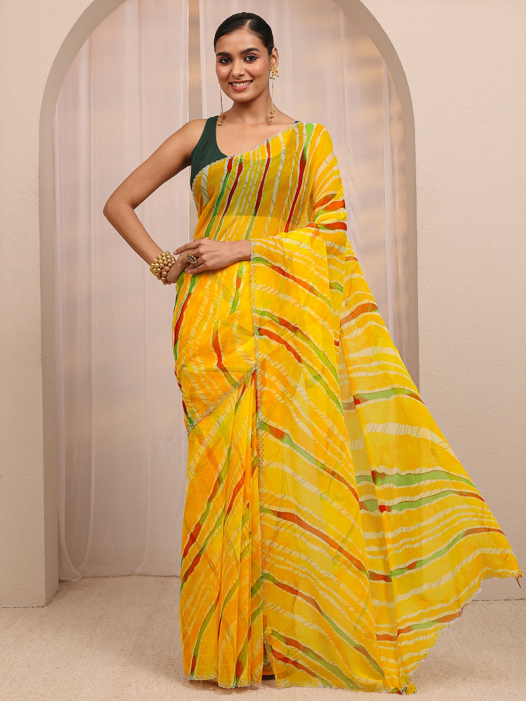  Yellow Leheriya Printed Silk Blend Saree 
With Unstitched Blouse Piece 