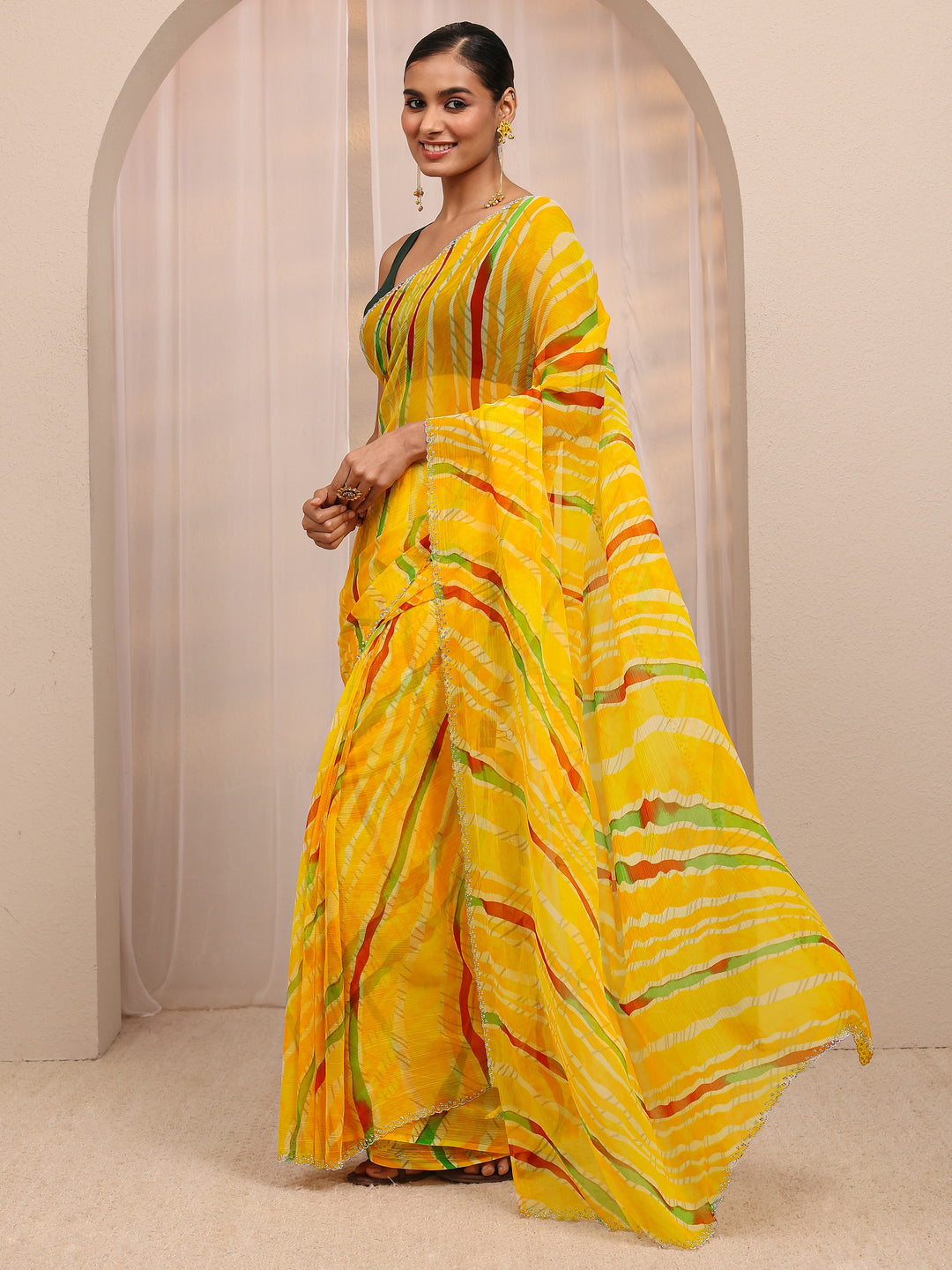  Yellow Leheriya Printed Silk Blend Saree 
With Unstitched Blouse Piece 