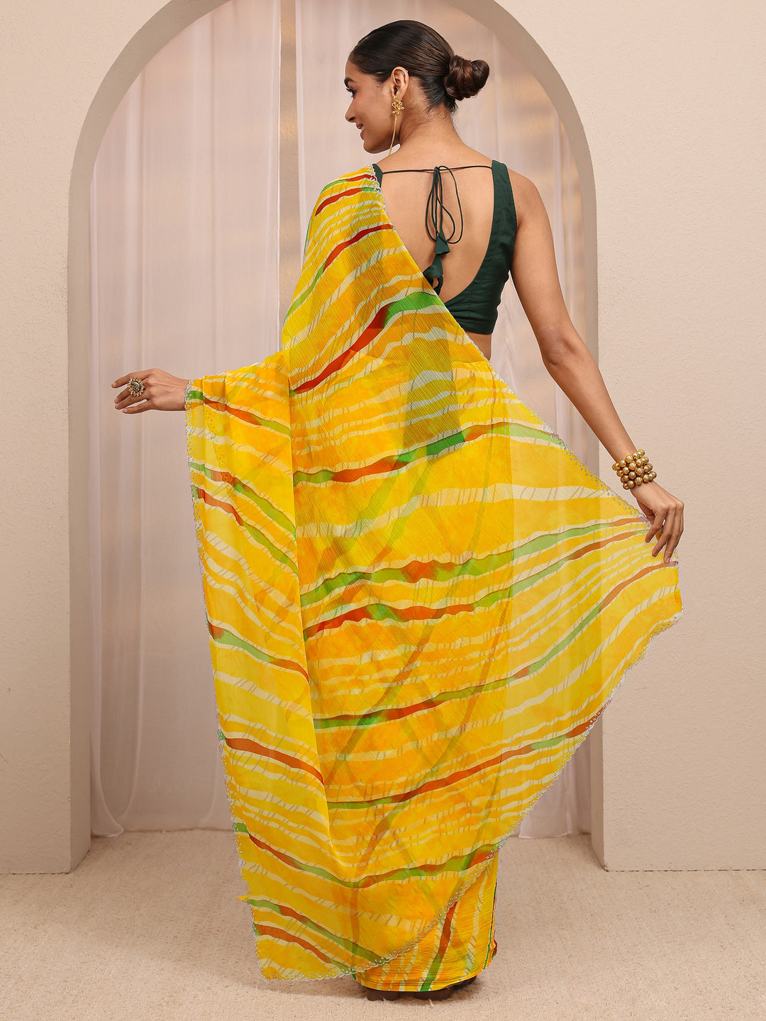  Yellow Leheriya Printed Silk Blend Saree 
With Unstitched Blouse Piece 