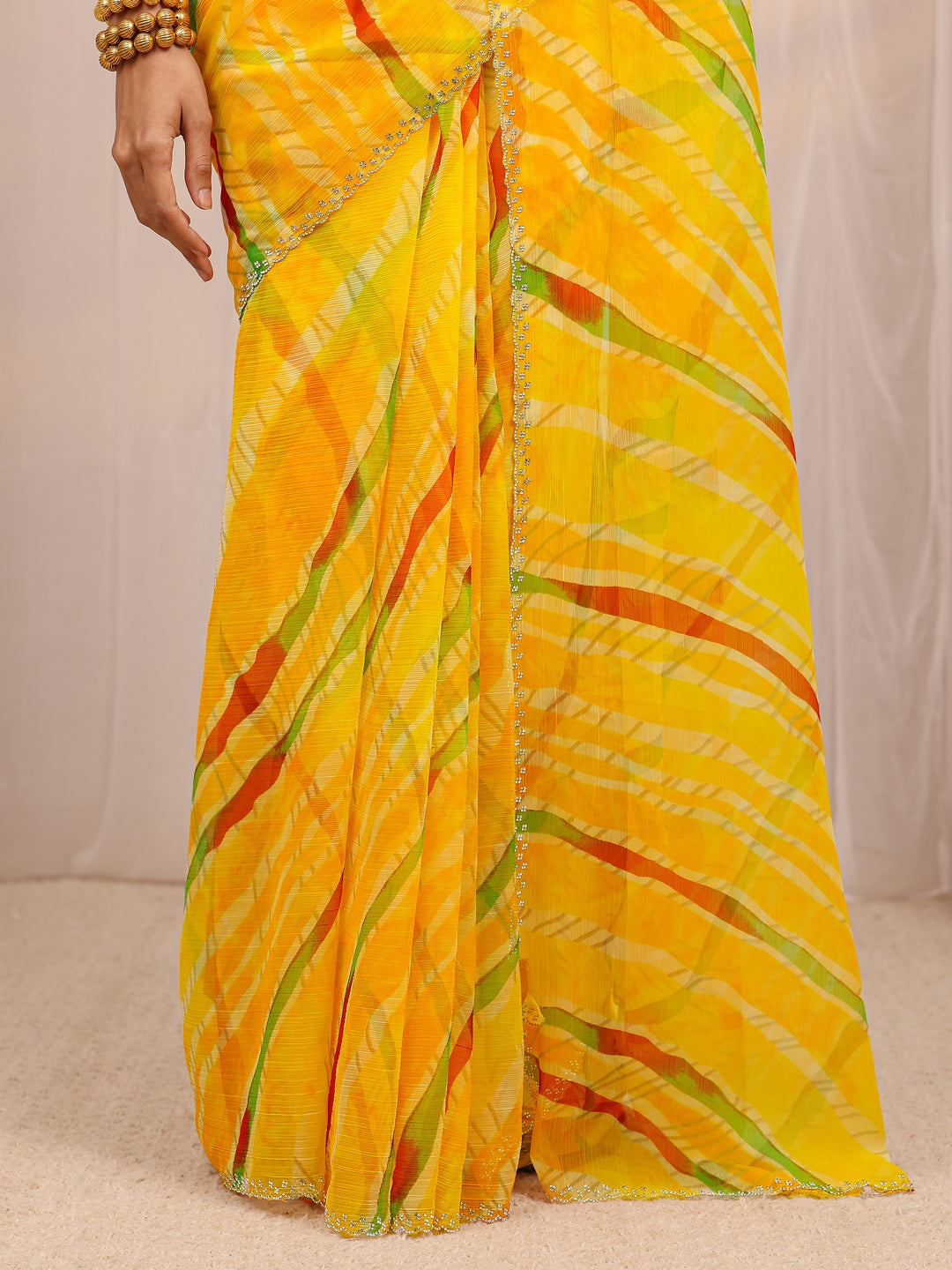  Yellow Leheriya Printed Silk Blend Saree 
With Unstitched Blouse Piece 