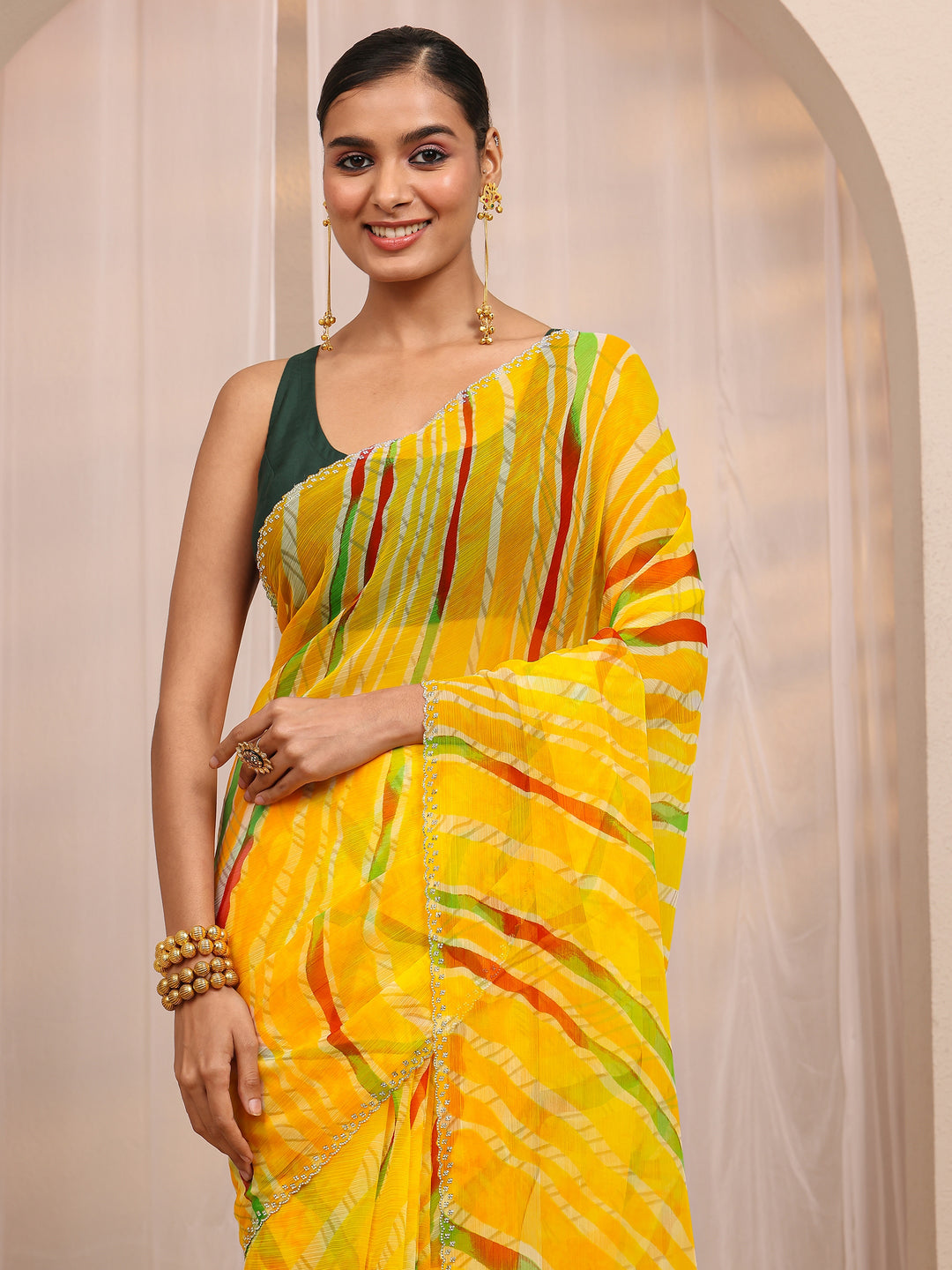  Yellow Leheriya Printed Silk Blend Saree 
With Unstitched Blouse Piece 