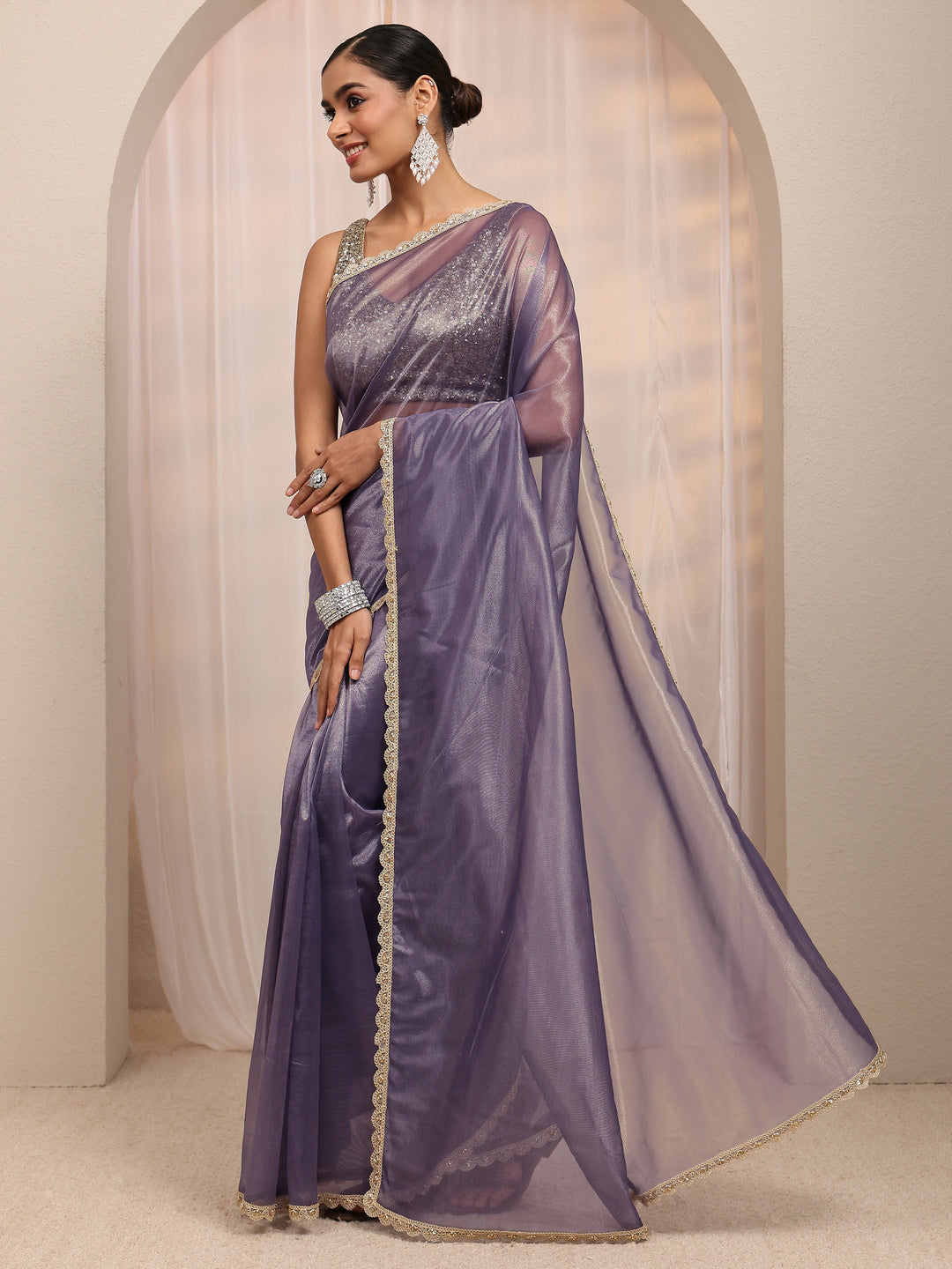  Purple Embellished Sheen Net Saree 
With Unstitched Blouse Piece 