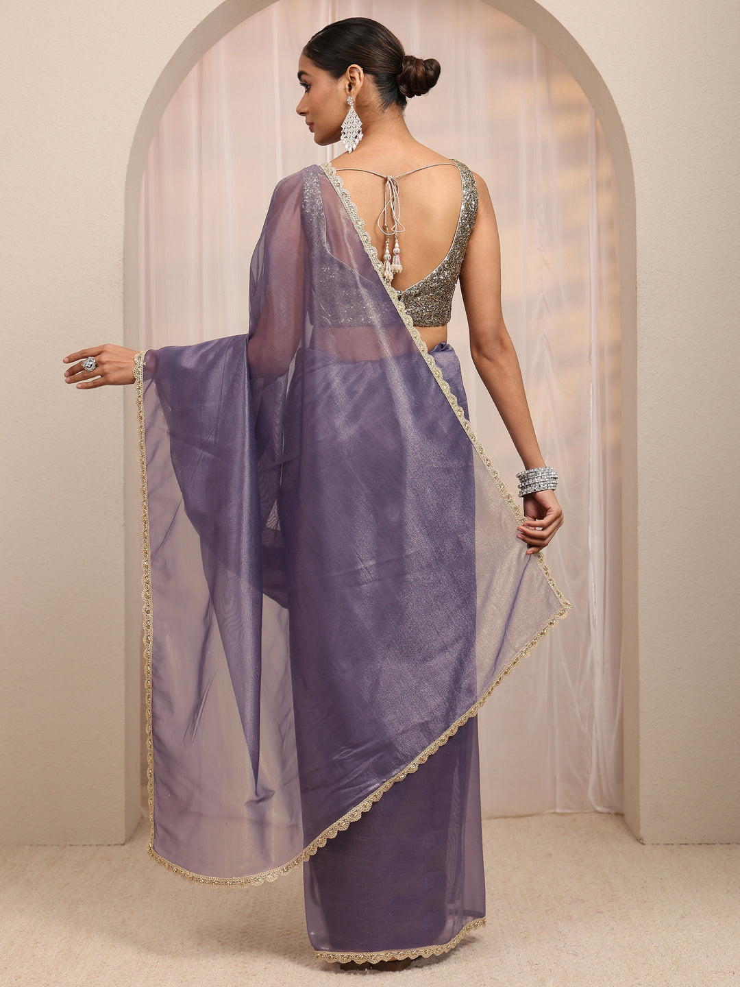  Purple Embellished Sheen Net Saree 
With Unstitched Blouse Piece 