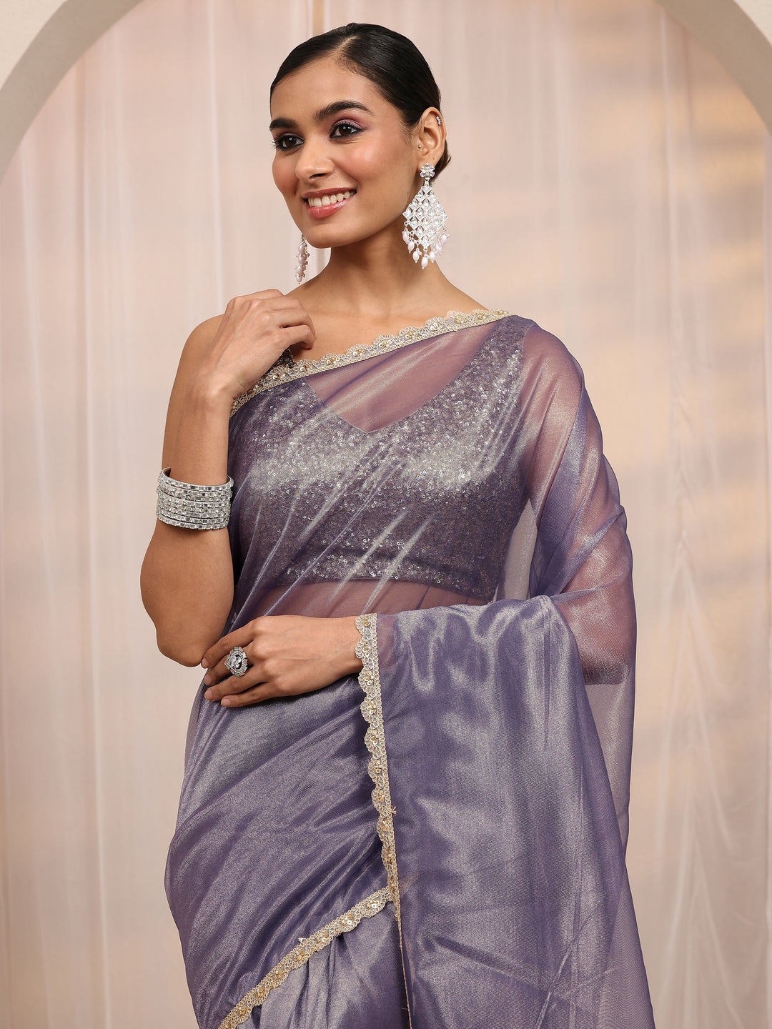  Purple Embellished Sheen Net Saree 
With Unstitched Blouse Piece 
