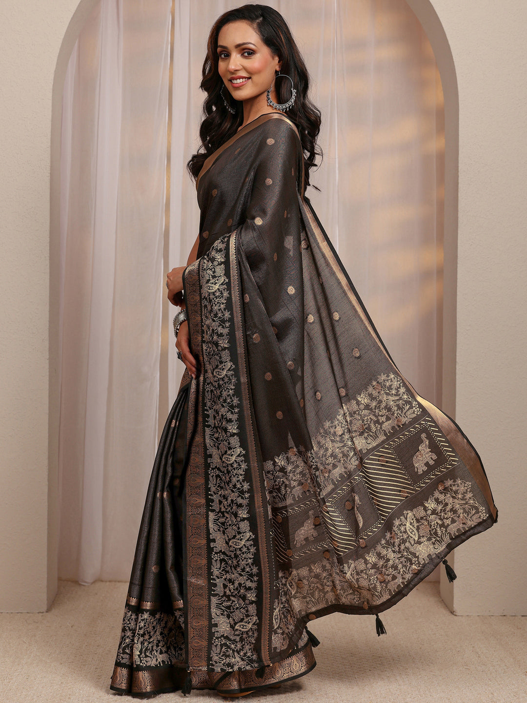  Black Ethnic Motif Woven Design Silk Blend Saree 
With Unstitched Blouse Piece 