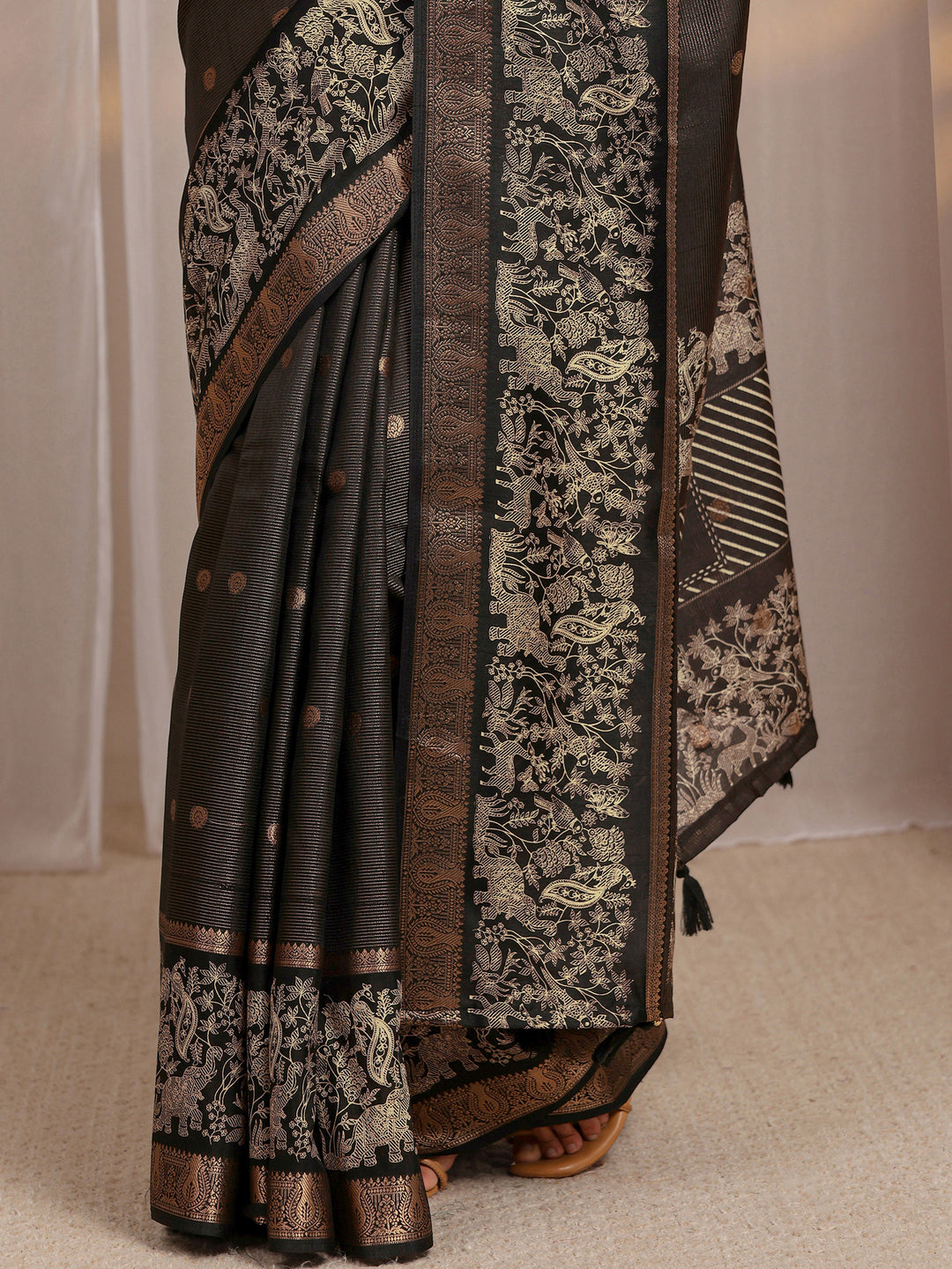  Black Ethnic Motif Woven Design Silk Blend Saree 
With Unstitched Blouse Piece 