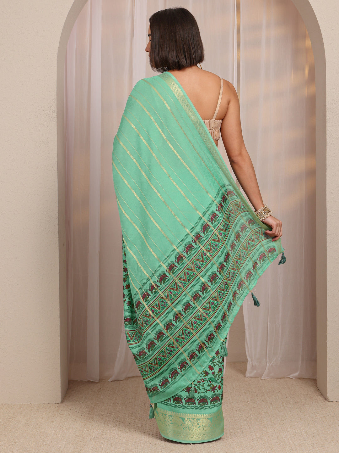  Green Striped Printed Pallu Silk Blend Saree 
With Unstitched Blouse Piece 