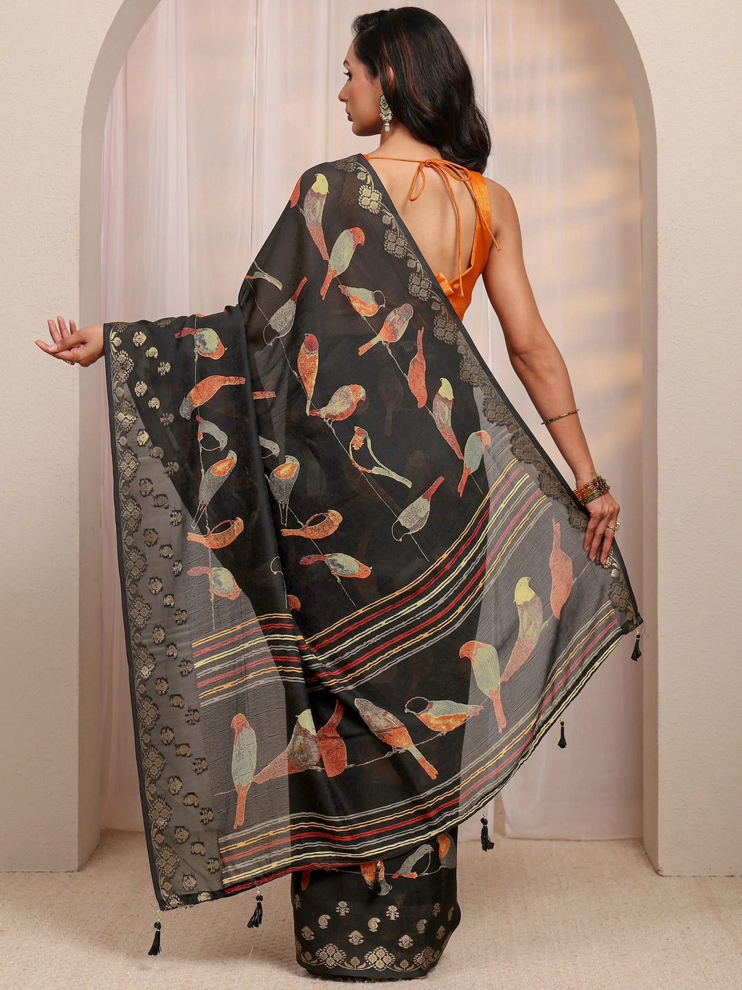  Black Quirky Printed Silk Blend Saree 
With Unstitched Blouse Piece 