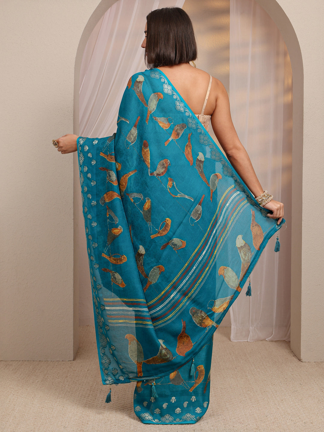  Blue Quirky Printed Silk Blend Saree 
With Unstitched Blouse Piece 