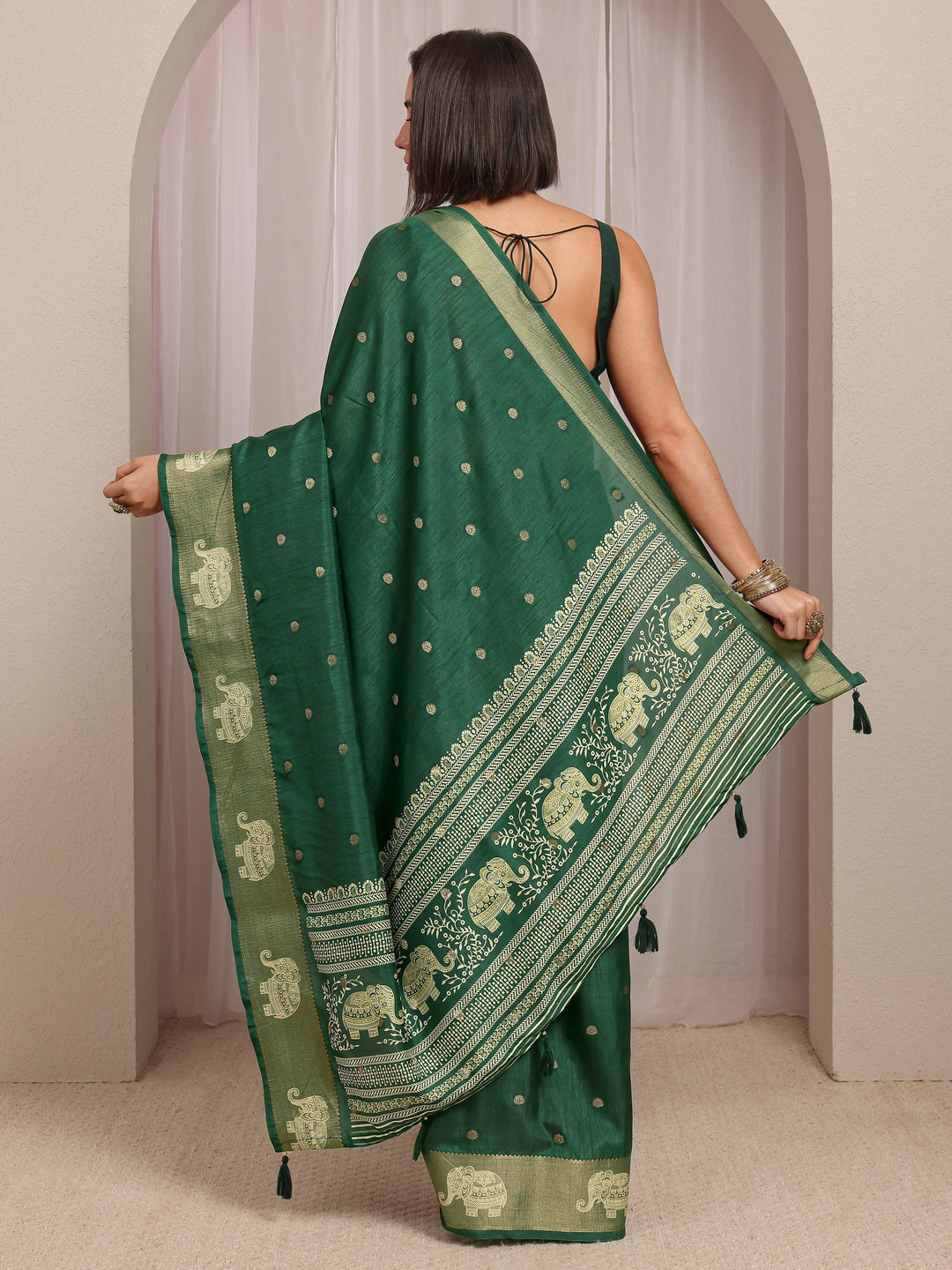  Green Woven Design Silk Blend Saree 
With Unstitched Blouse Piece 