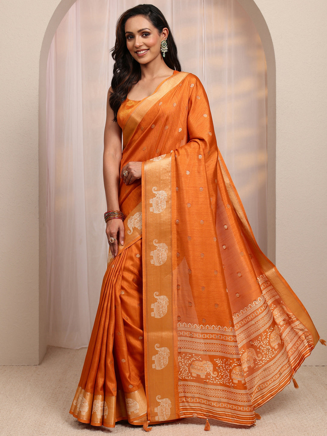  Orange Ethnic Motif Woven Design Silk Blend Saree 
With Unstitched Blouse Piece 