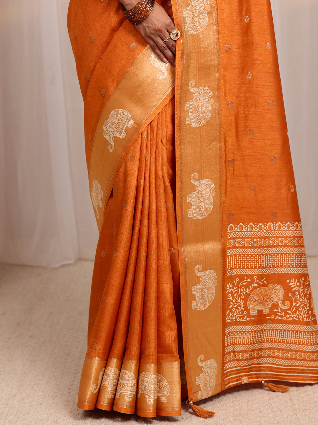  Orange Ethnic Motif Woven Design Silk Blend Saree 
With Unstitched Blouse Piece 