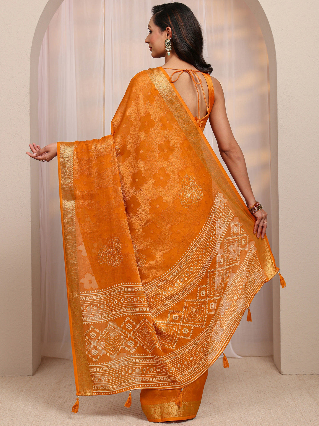  Orange Floral Woven Design Silk Blend Saree 
With Unstitched Blouse Piece 