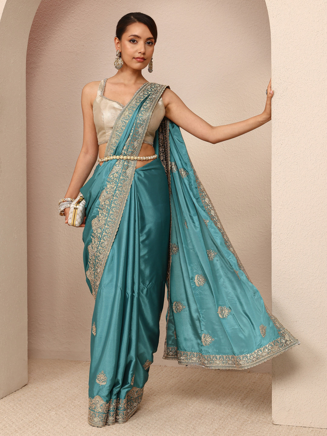 Blue Ethnic Embroidered Silk Blend Saree
With Unstitched Blouse Piece