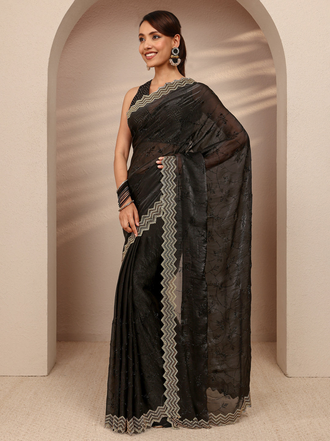  Black Embellished Silk Blend Saree
With Unstitched Blouse Piece 