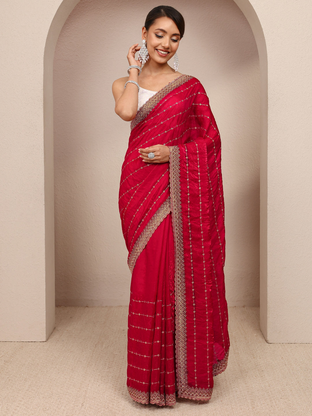  Red Embellished Silk Blend Saree
With Unstitched Blouse Piece 