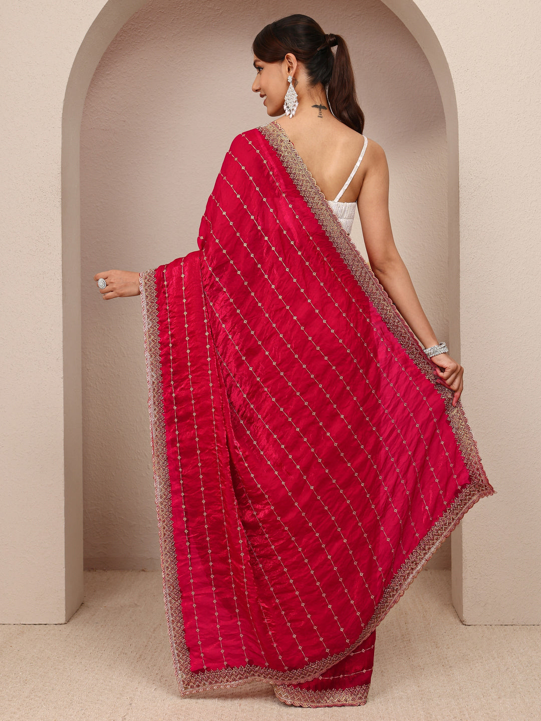  Red Embellished Silk Blend Saree
With Unstitched Blouse Piece 