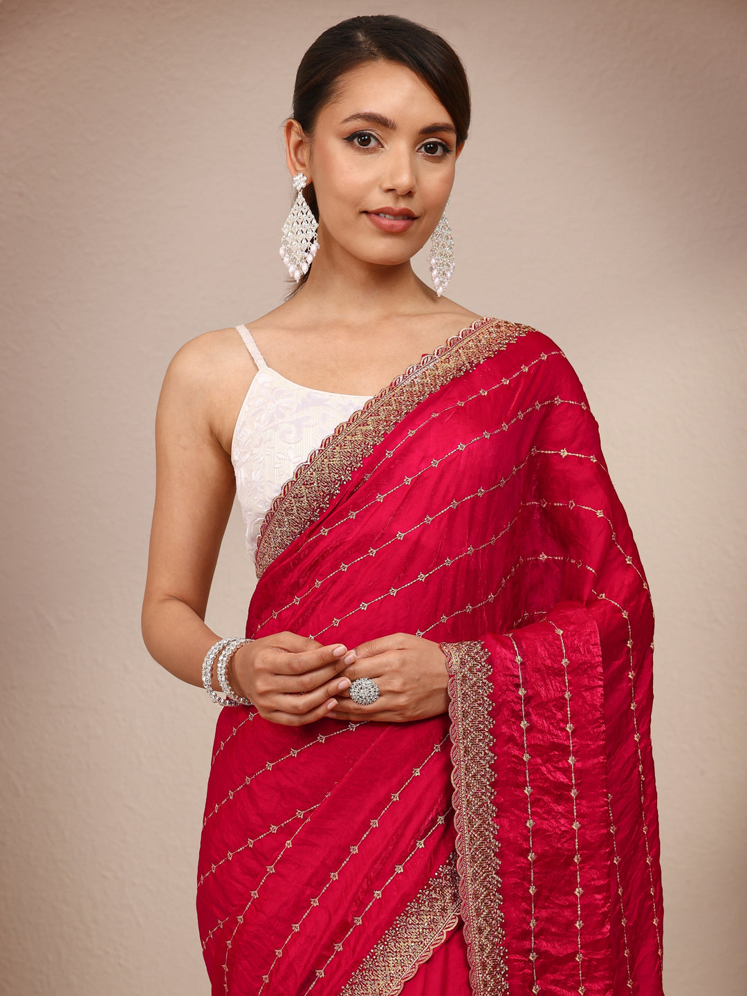 Red Embellished Silk Blend Saree
With Unstitched Blouse Piece 